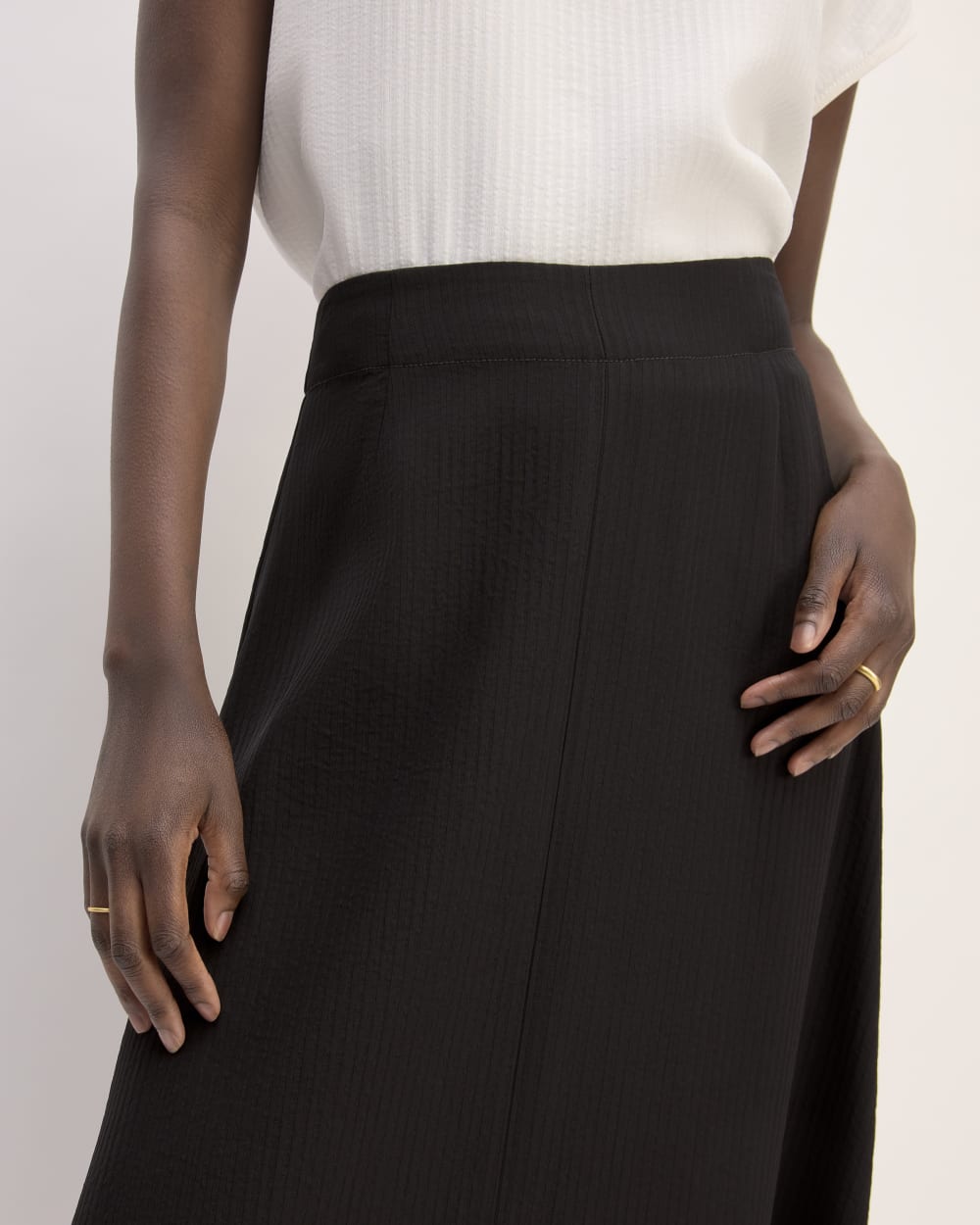 The Mini Jacquard Stripe Slip Skirt in Black — detail view