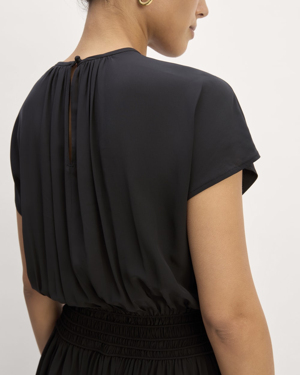 The Gathered Midi Dress in Black — detail view