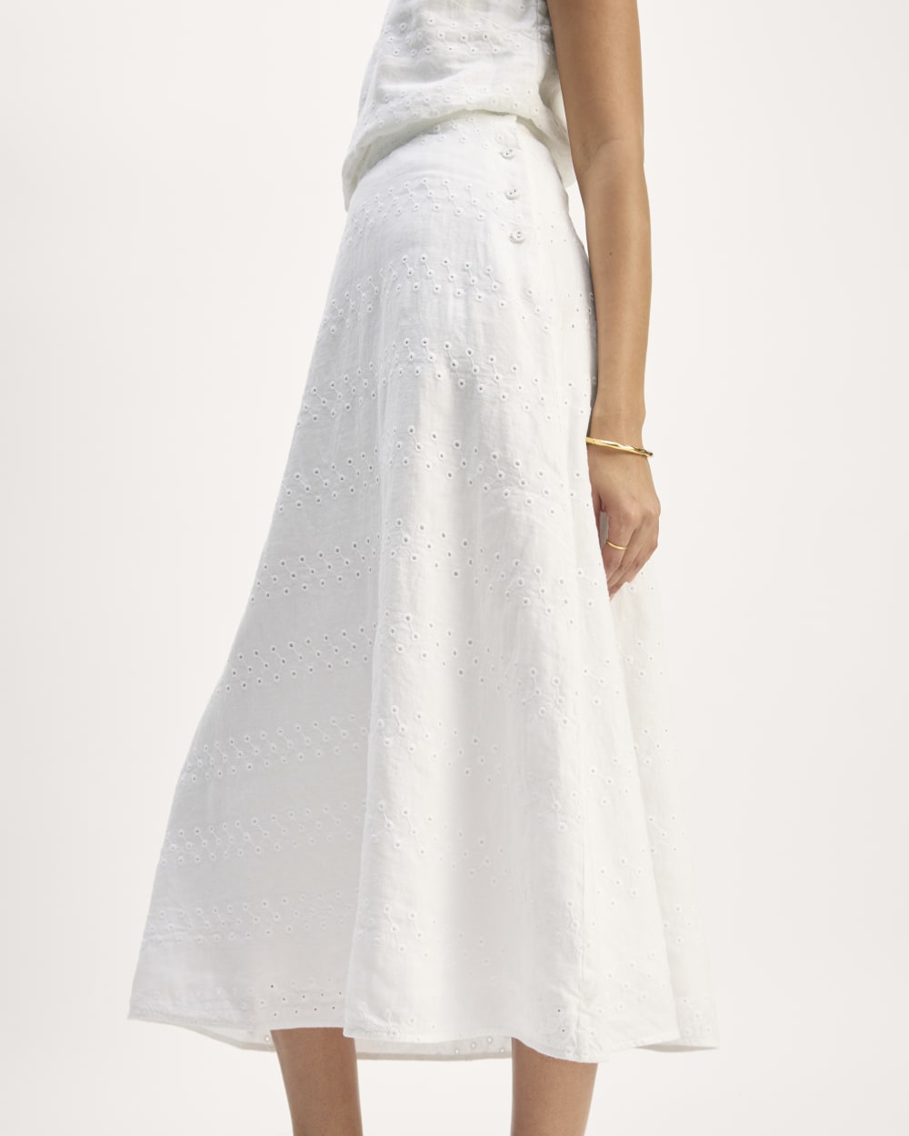 The Linen Eyelet Midi Skirt in White Eyelet — detail view