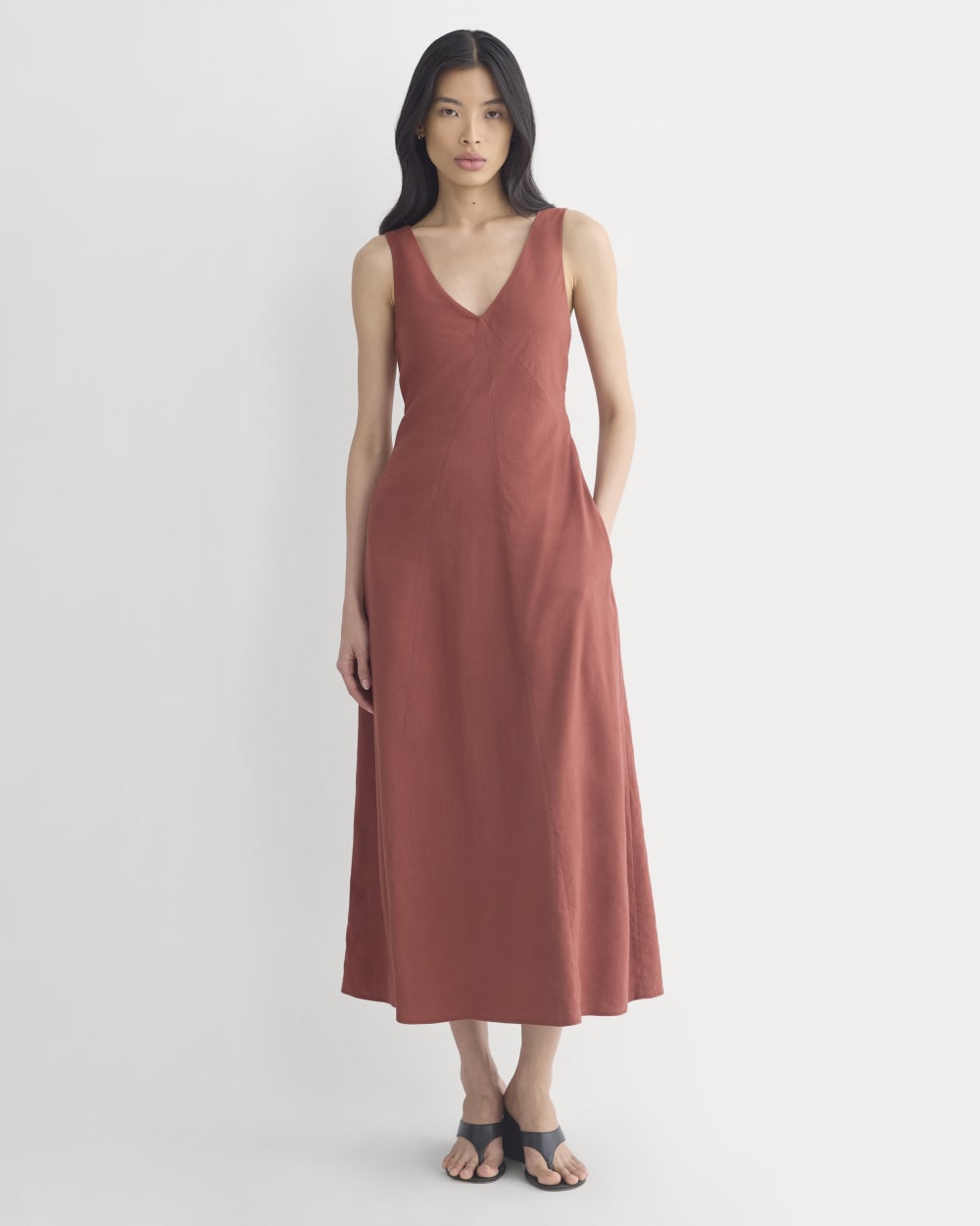 Deep V Seamed Dress in Stretch Linen in Henna Red — front view