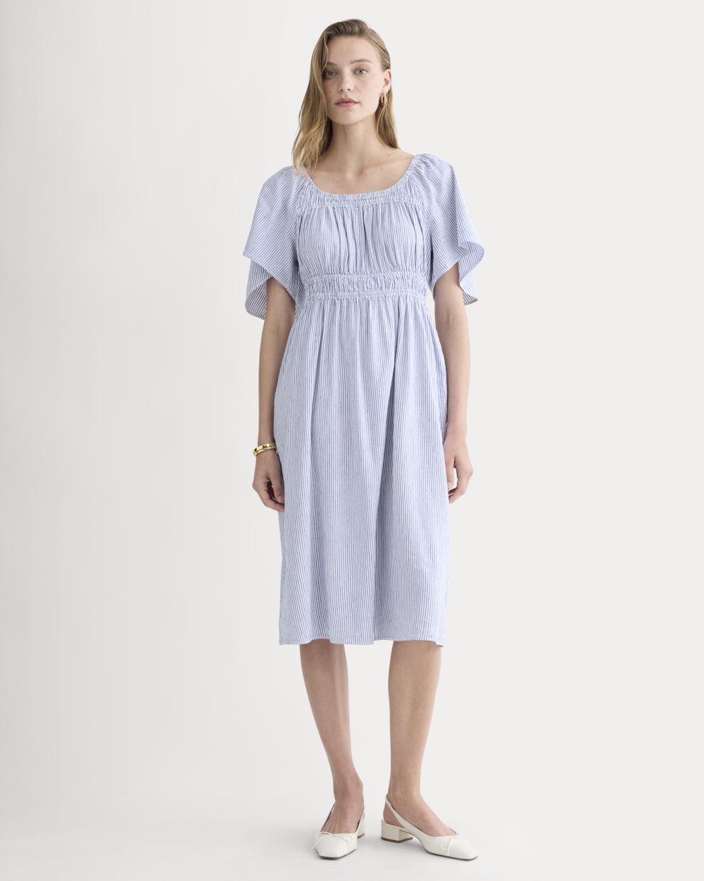 The Flutter-Sleeve Dress in Stretch Linen in White / Dutch Blue — front view