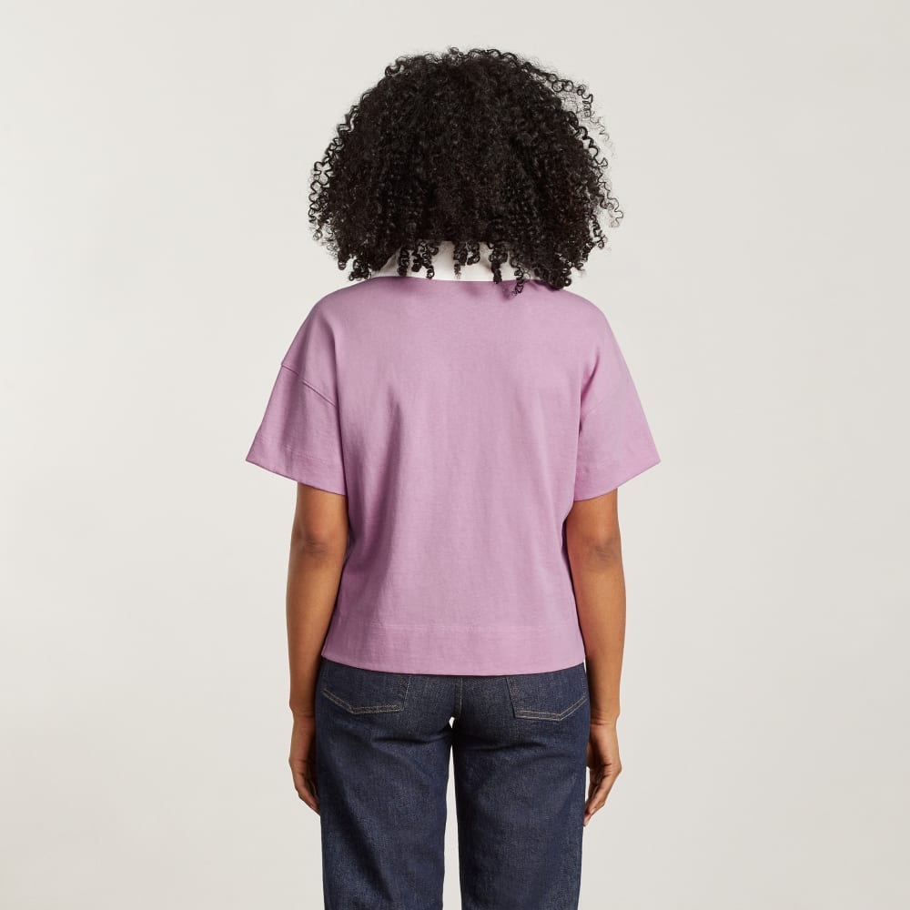 The Retro Jersey Polo in Mauve / Bone — detail view