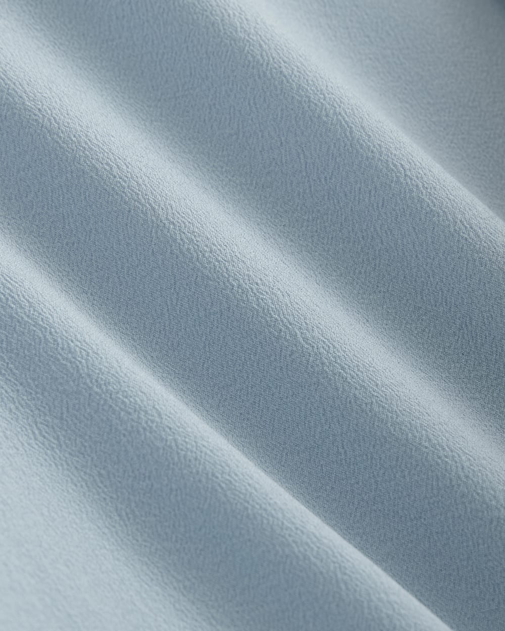 The Must-Have Shirt in Washable Silk in Soft Blue — detail view