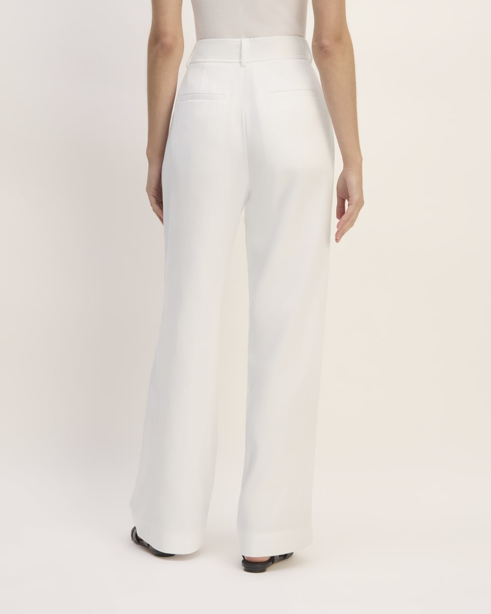 The Draper Pleated Pant in Buttersmooth in White — detail view