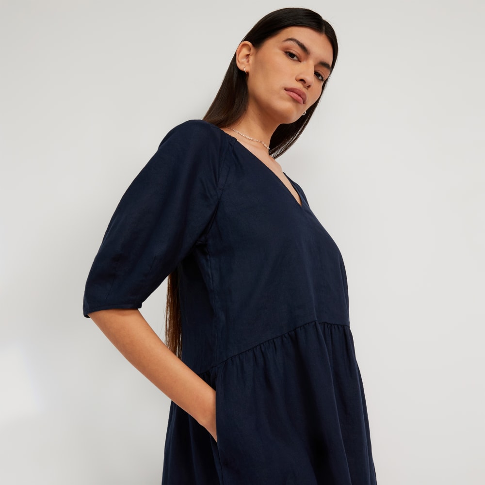 The Linen Oversized Puff-Sleeve Dress in Navy — detail view