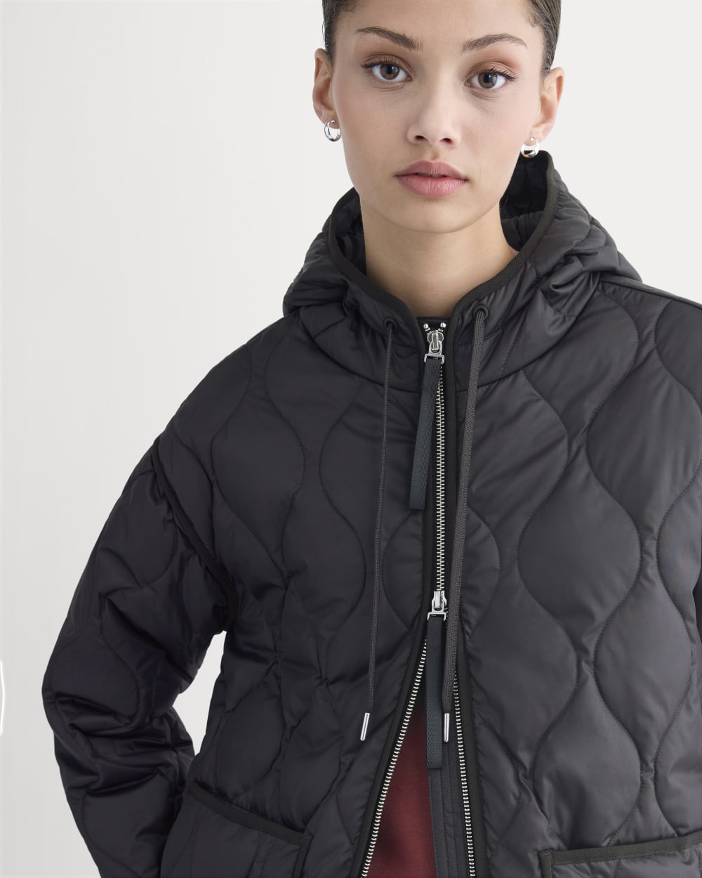 ReNew Quilted Hooded Liner in Black — detail view