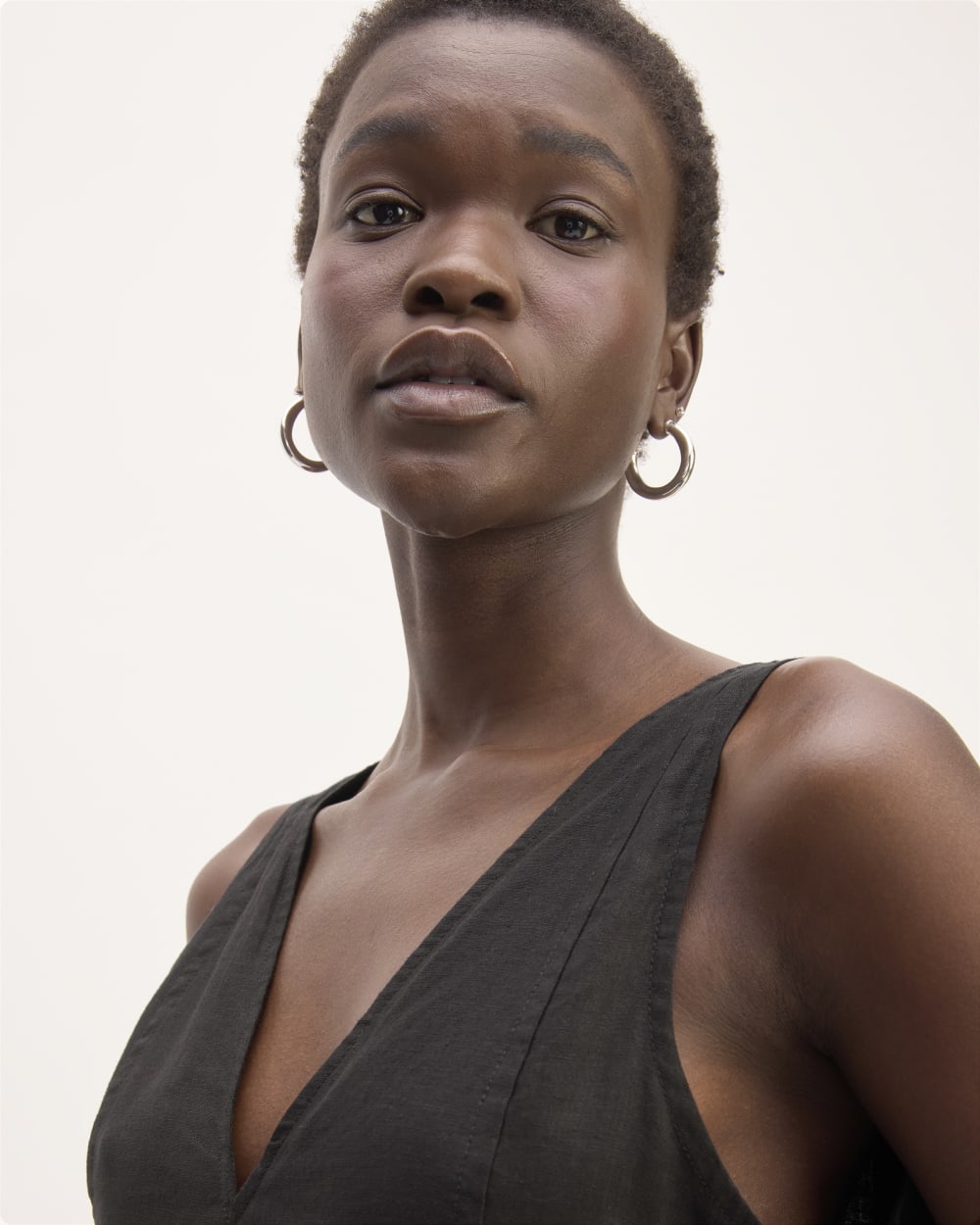 The Linen V-Neck Midi Dress in Black — detail view