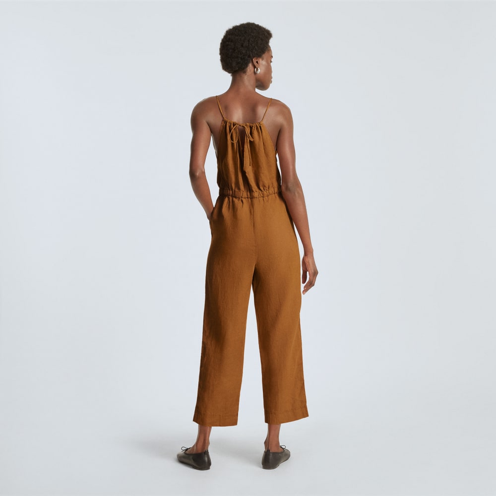 The Linen Shoestring Jumpsuit in Tawny Brown — detail view