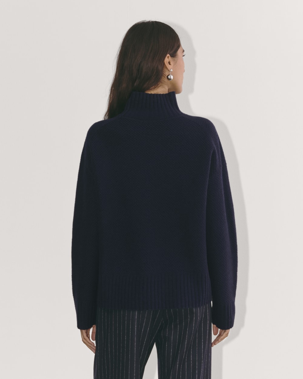 The Honeycomb Funnel Neck in Wool Cashmere in Navy — detail view