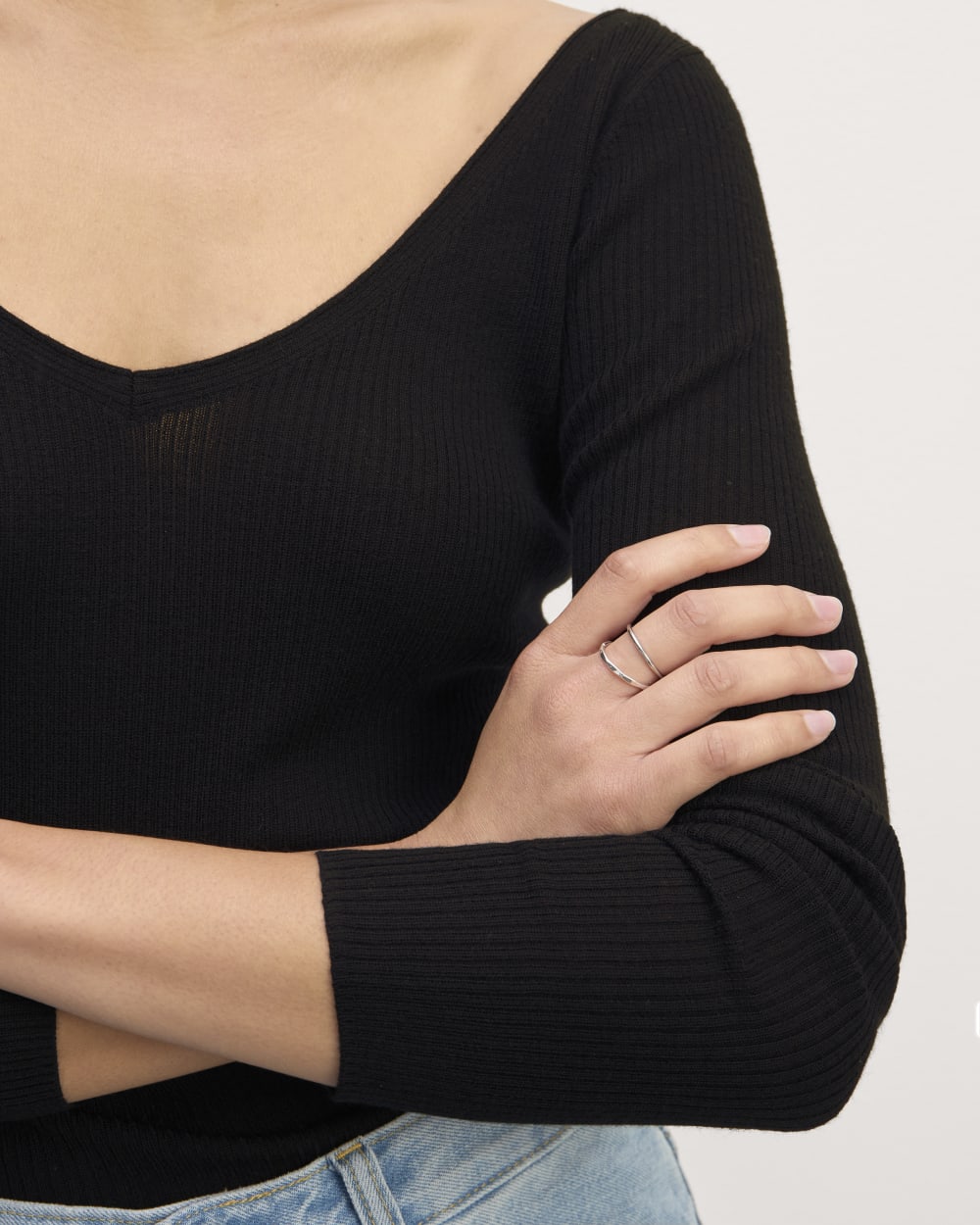 The Off-Shoulder Top in Ultrasoft Merino in Black — detail view