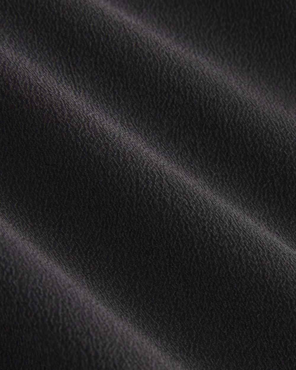 The Boxy Shirt in Washable Silk in Black — detail view