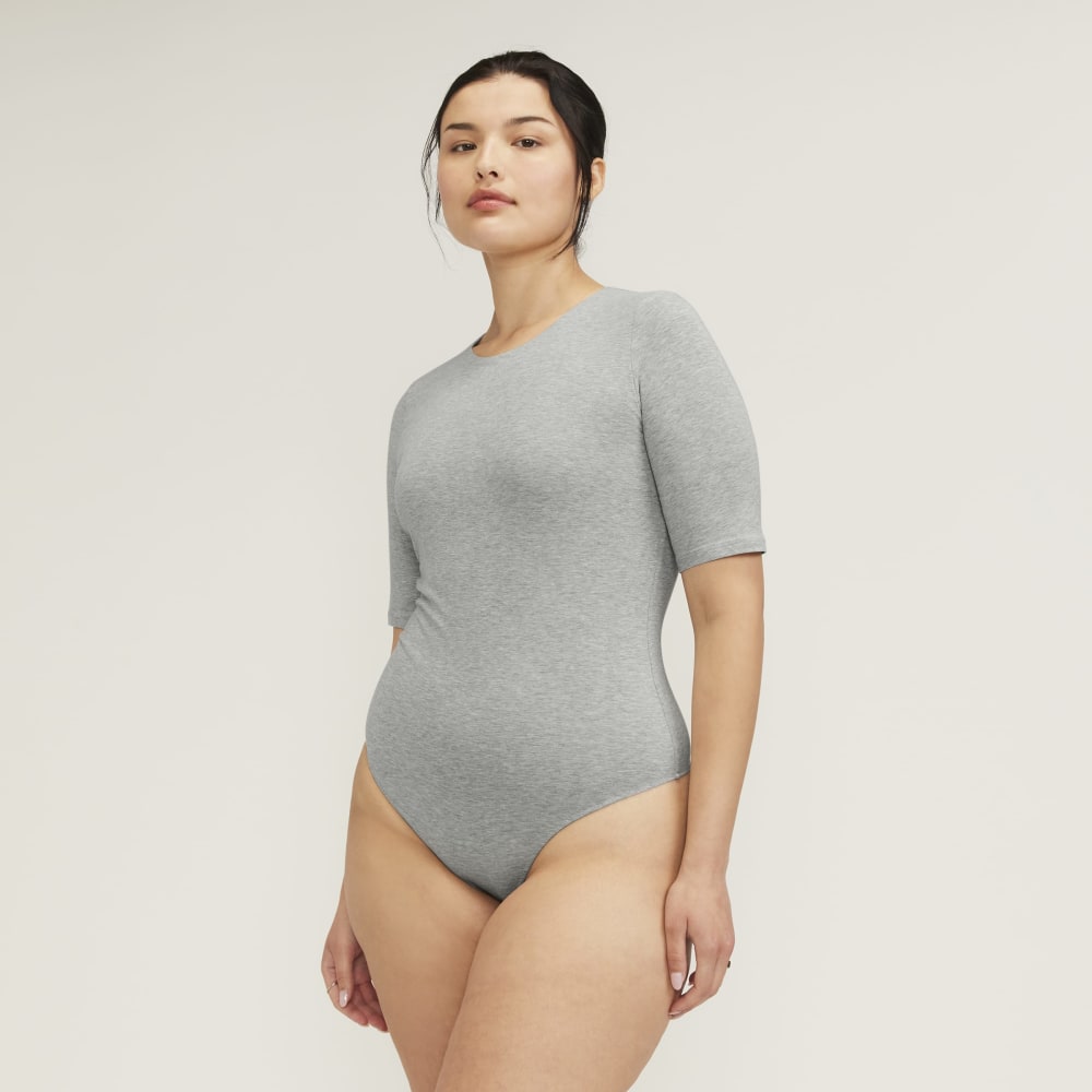 The Short-Sleeve Crew Neck Bodysuit in Heathered Grey — detail view