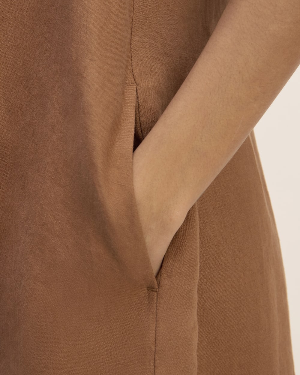 The Daytripper Dress in Linen in Carob Brown — detail view