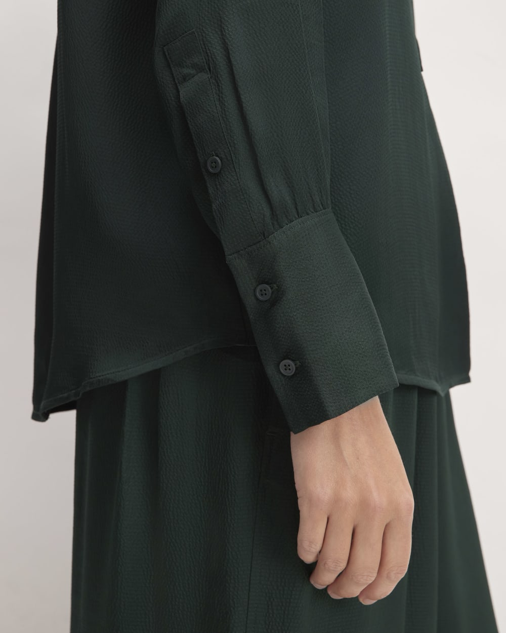 The Hammered Satin Popover Shirt in Scarab — detail view