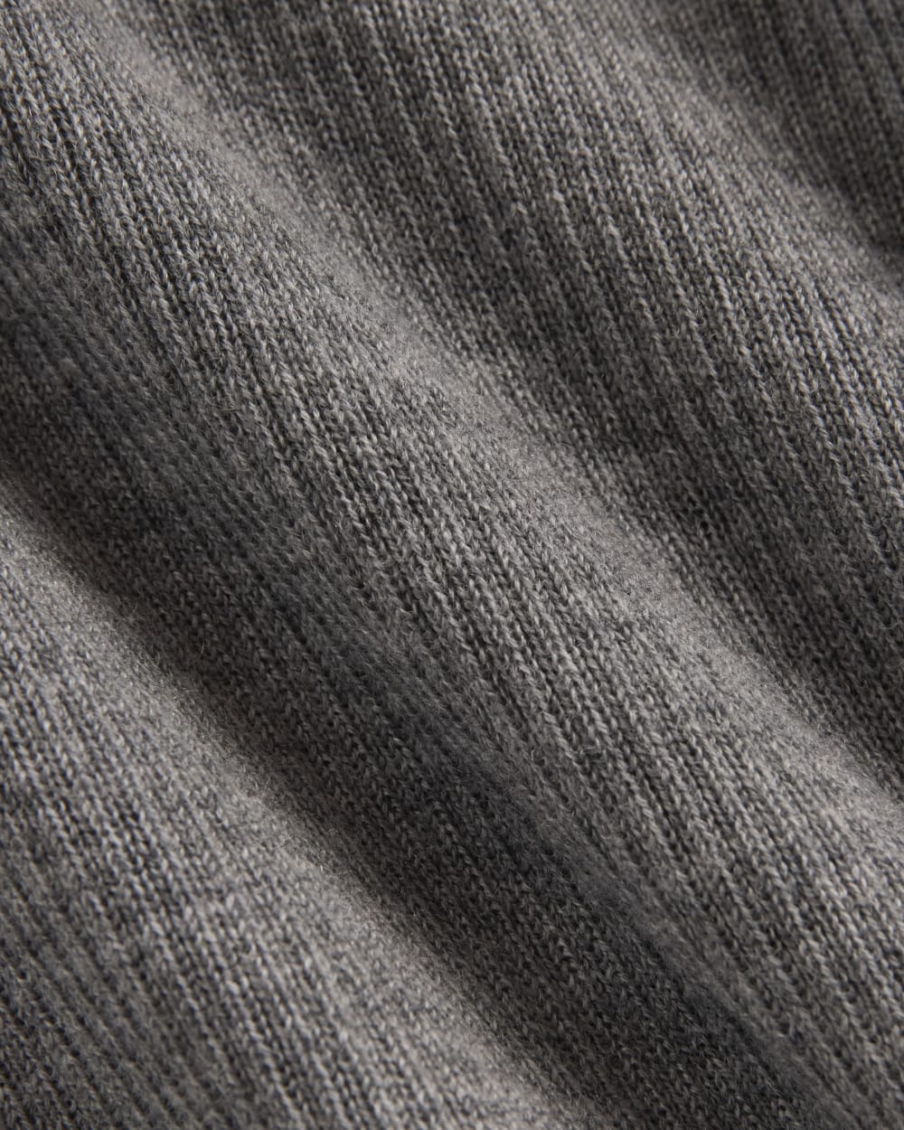 The Polo in Ultrasoft Merino in Heather Mid Grey — detail view