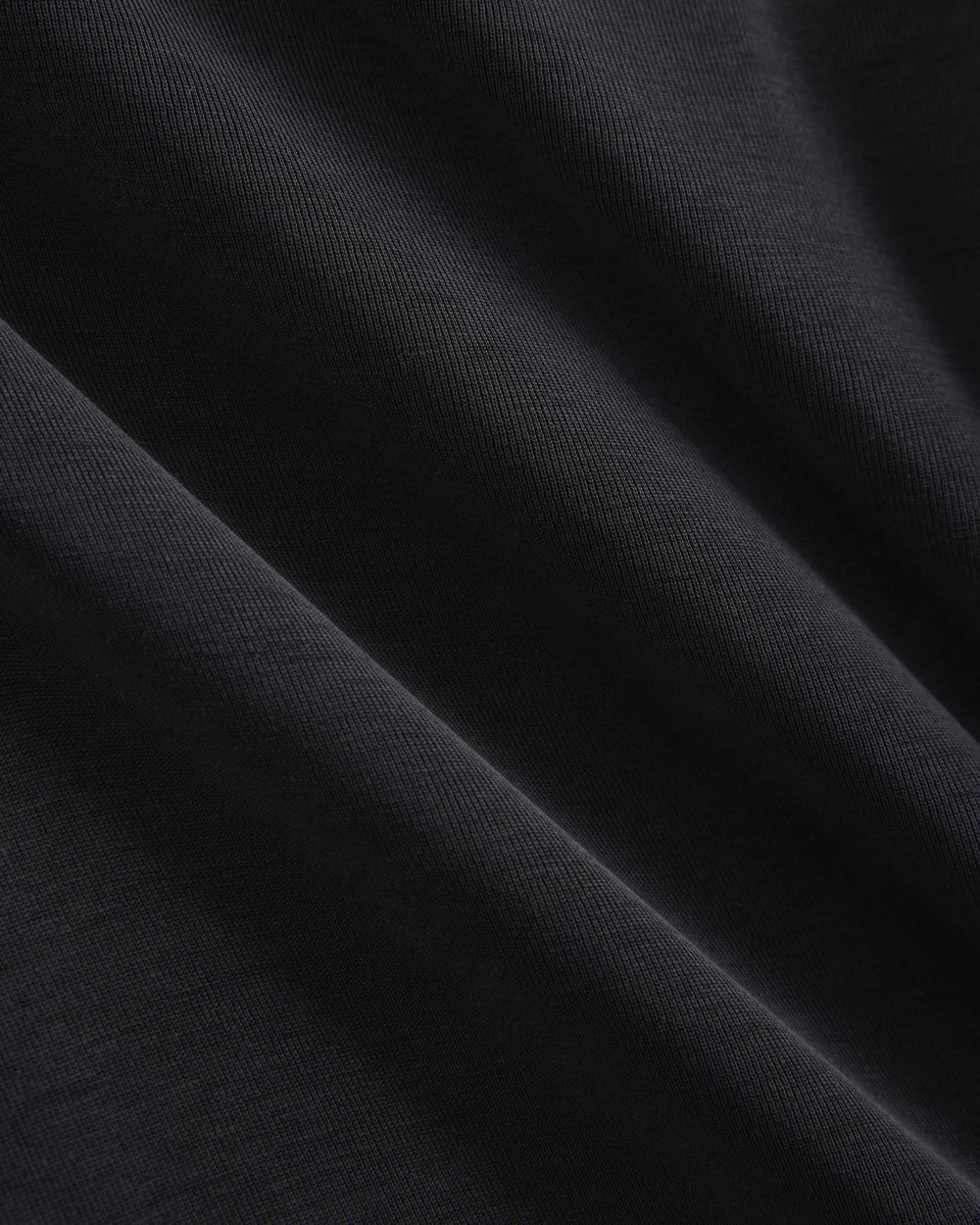 Knit Asymmetrical Midi Dress in Black — detail view