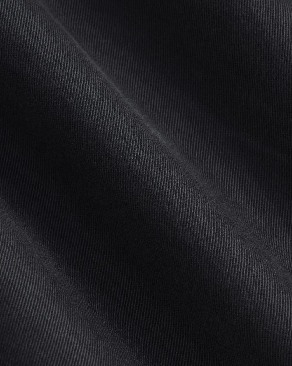 The Pleated Chino Short in Black — detail view