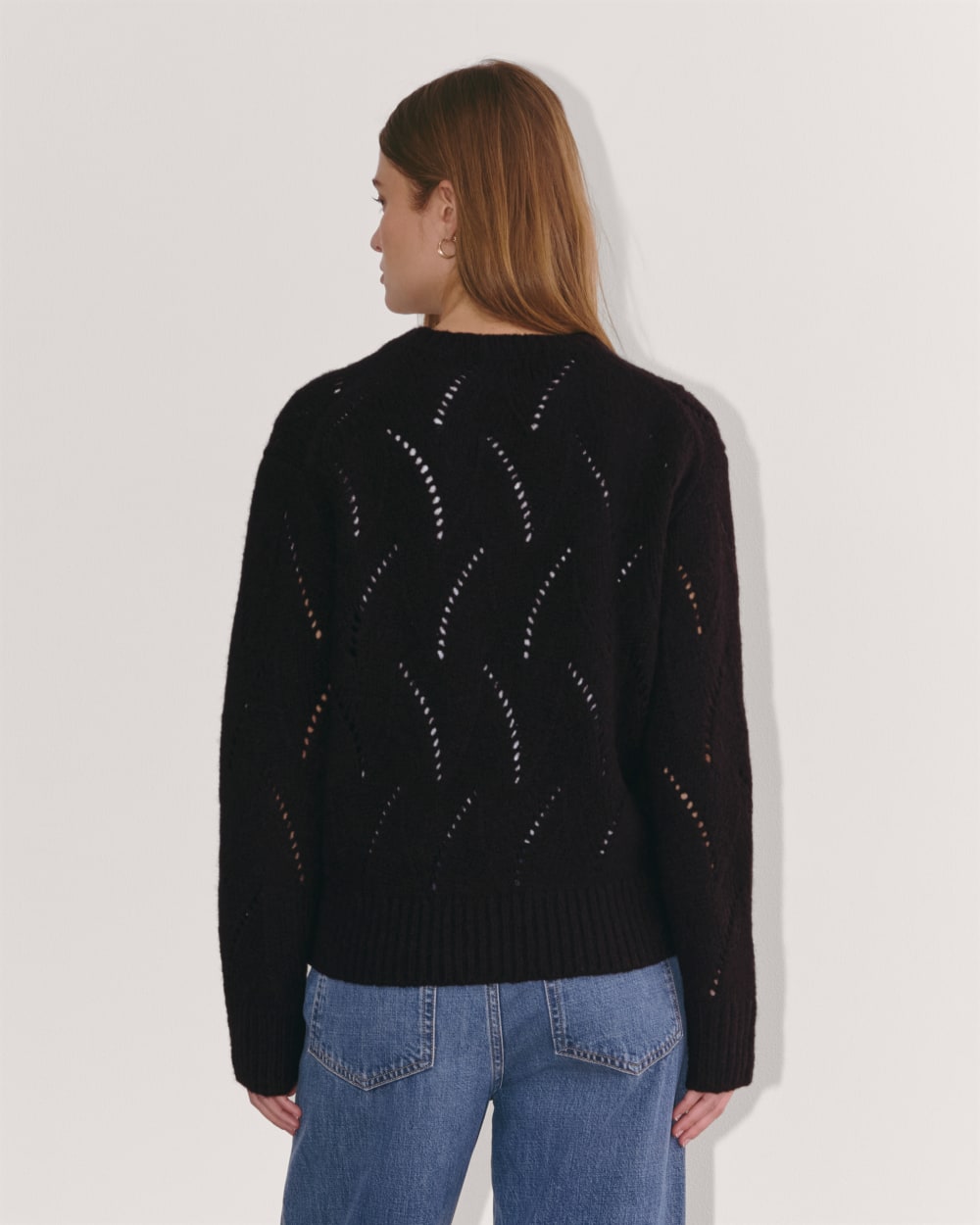 The Pointelle Sweater in Cloud in Black — detail view