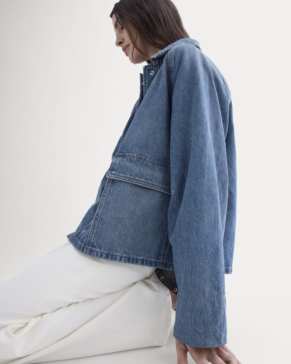 Cropped Denim Jacket in Medium Indigo — detail view