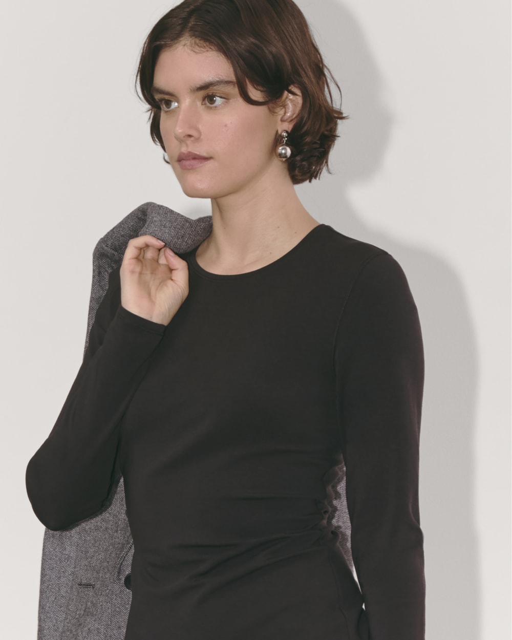 The Form Mini Dress in Black — detail view