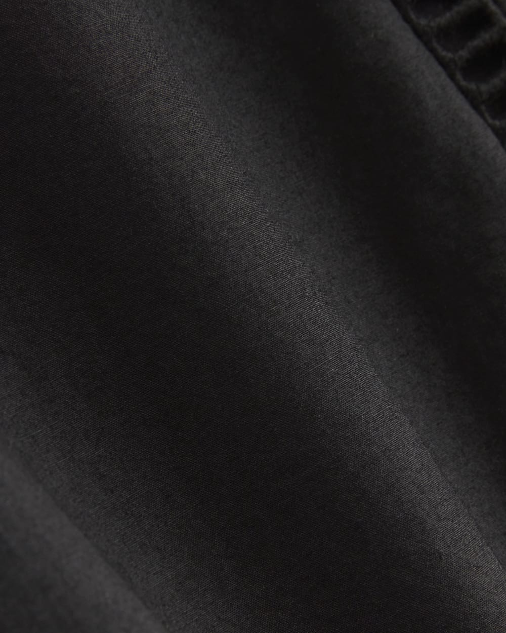 The Lace Trim Caftan Dress in Black — detail view