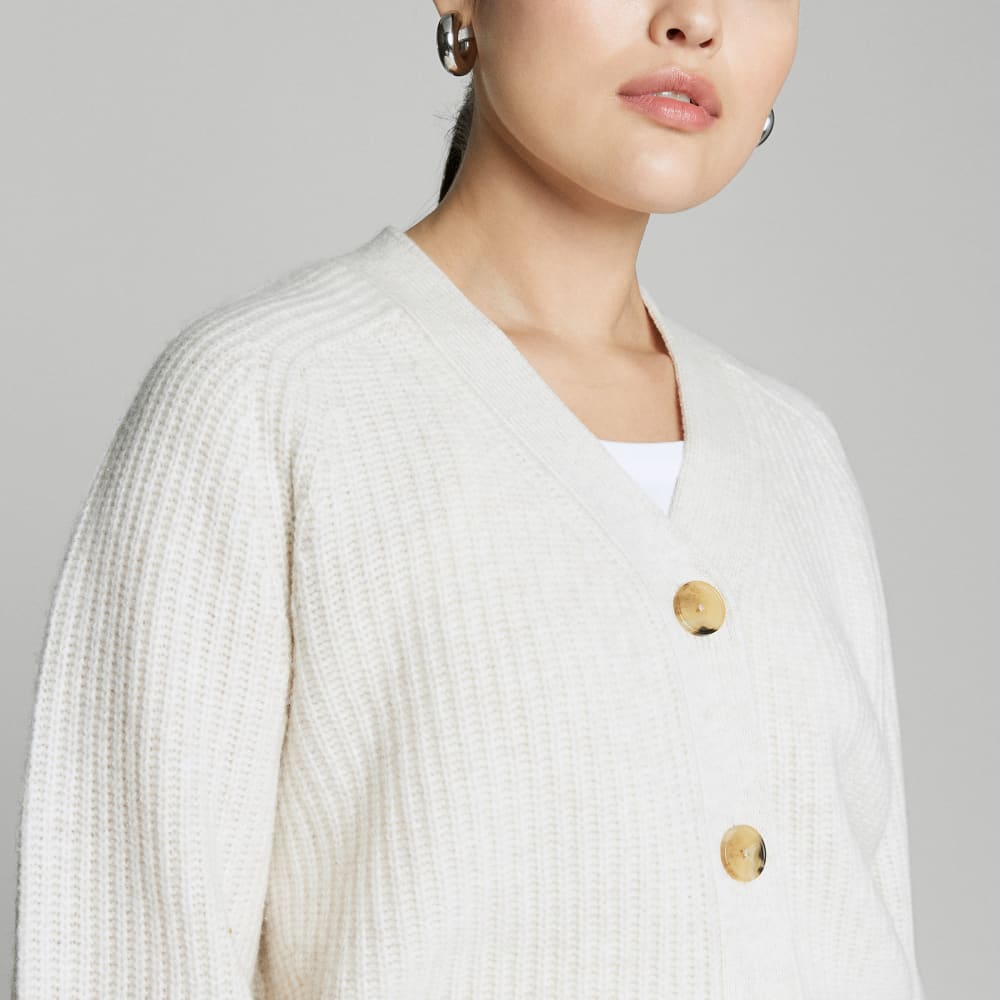 The Felted Merino Cardigan in Heathered Oat — detail view