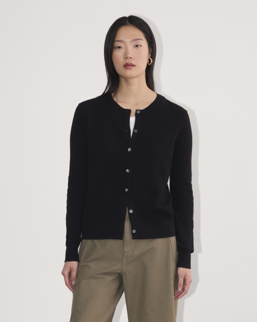 The Classic Cardigan in Cashmere in Black — front view