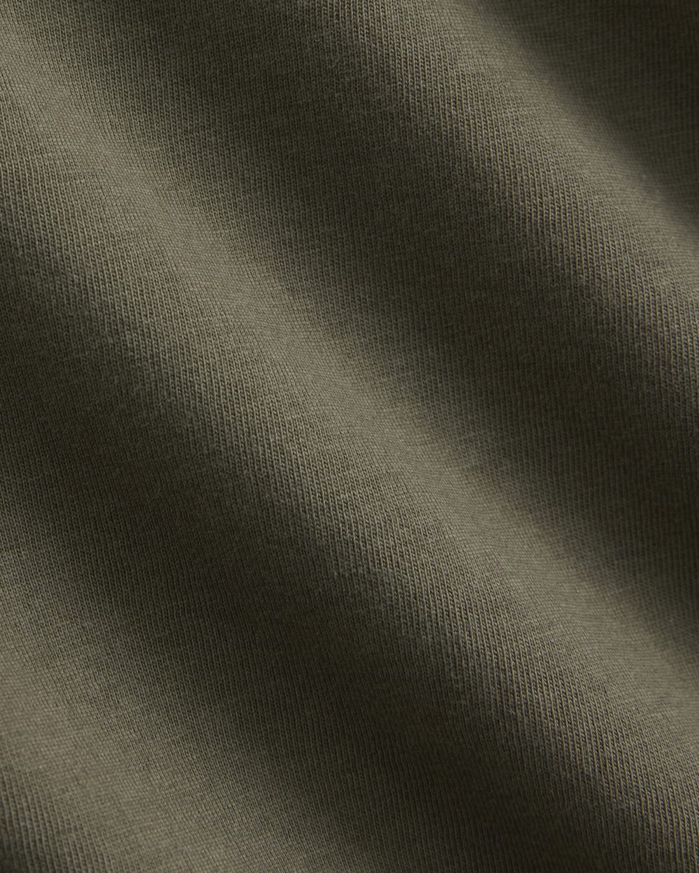 The Slim V-Neck Tee in Essential Cotton in Olive Night — detail view