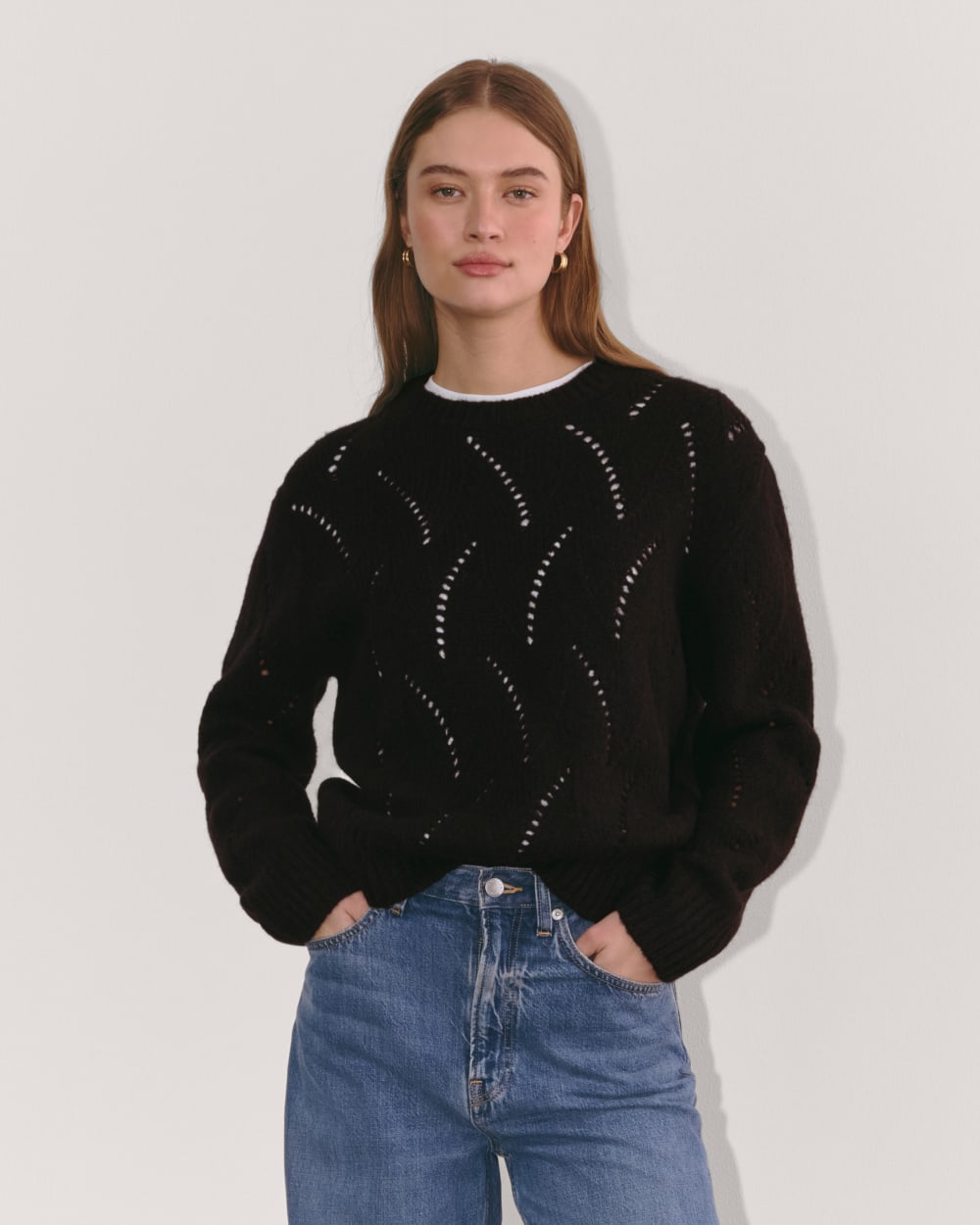 The Pointelle Sweater in Cloud in Black — front view