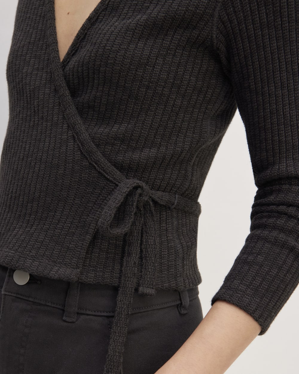 The Cozy Rib Wrap Top in Black — detail view