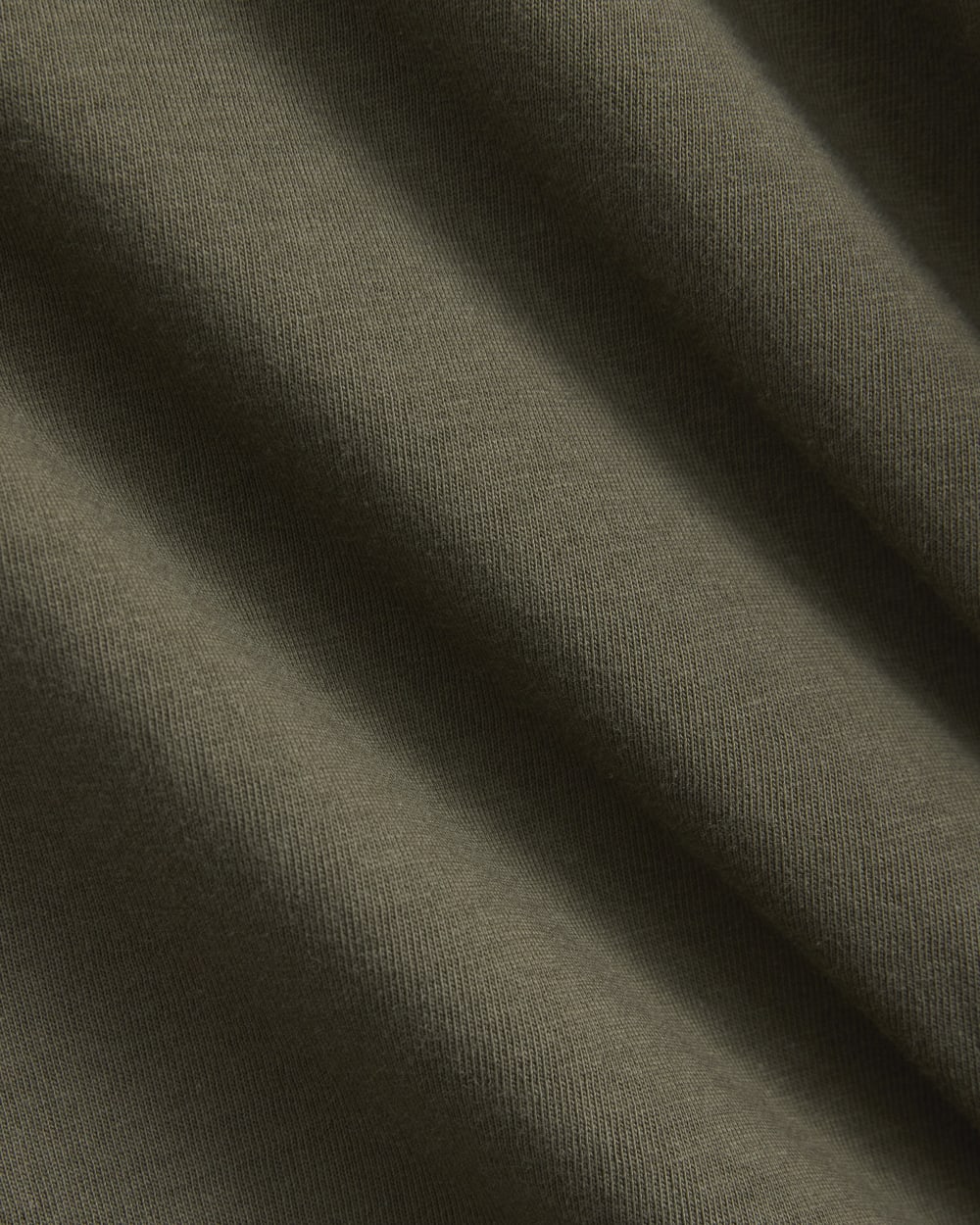 The Box-Cut Tee in Essential Cotton in Olive Night — detail view