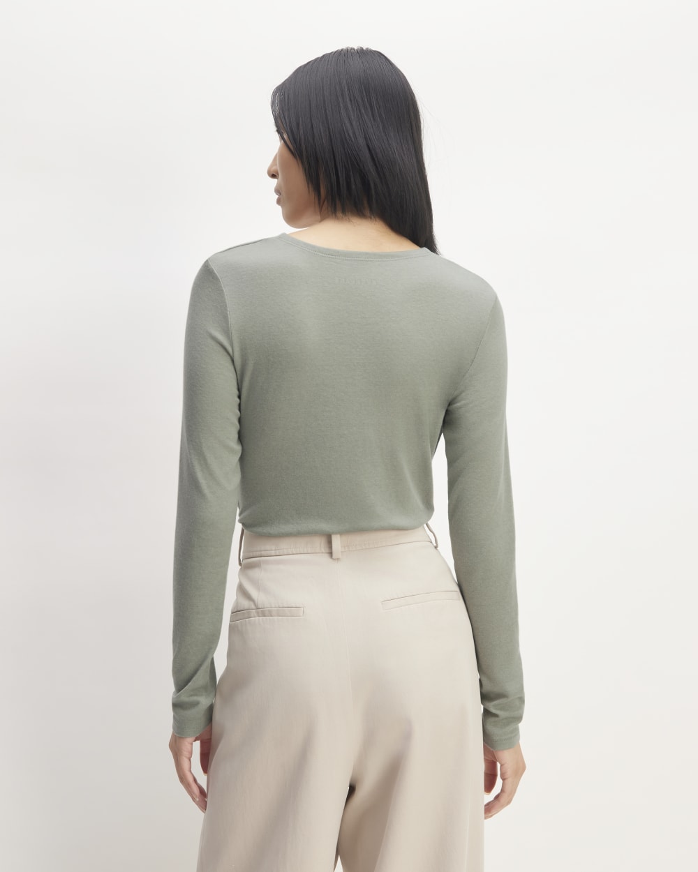 The Ruched V-Neck Tee in Butterluxe in Sage Green — detail view