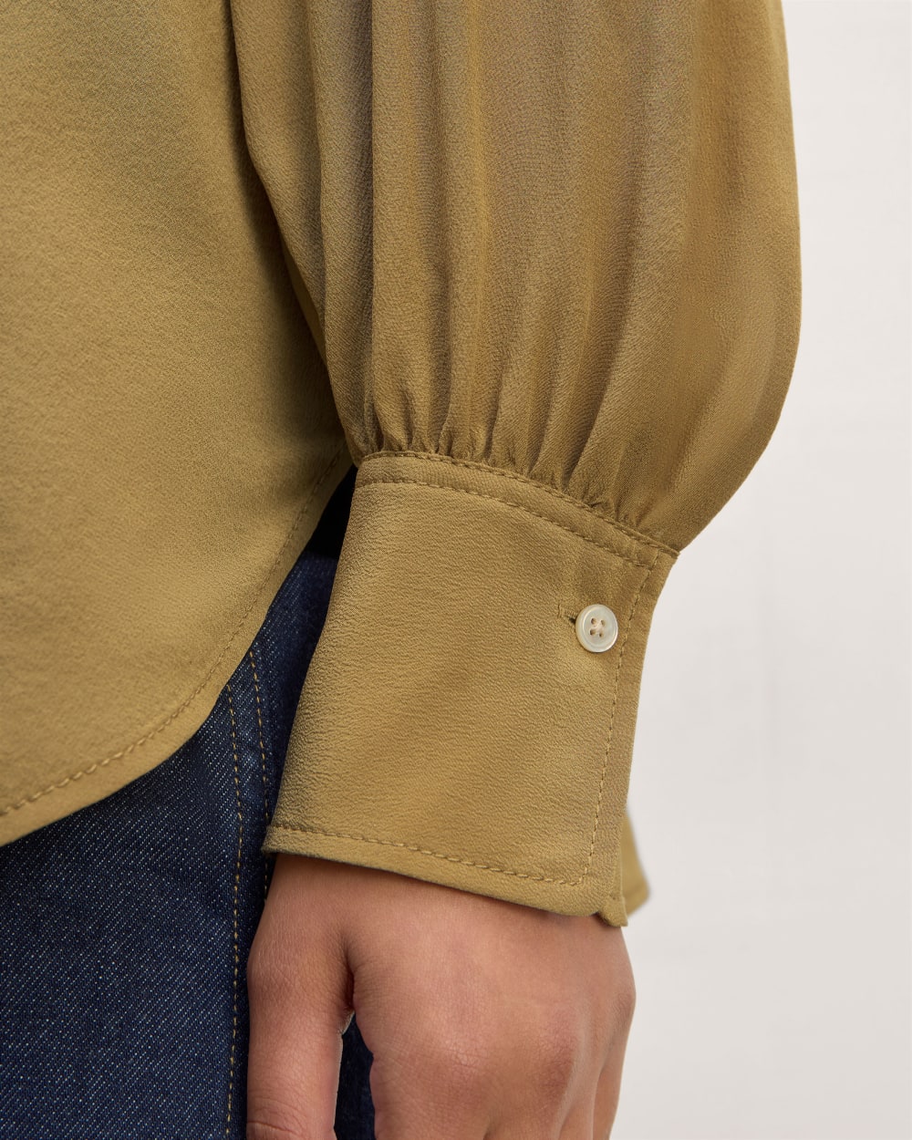The Henley Shirt in Washable Silk in Fennel Seed — detail view