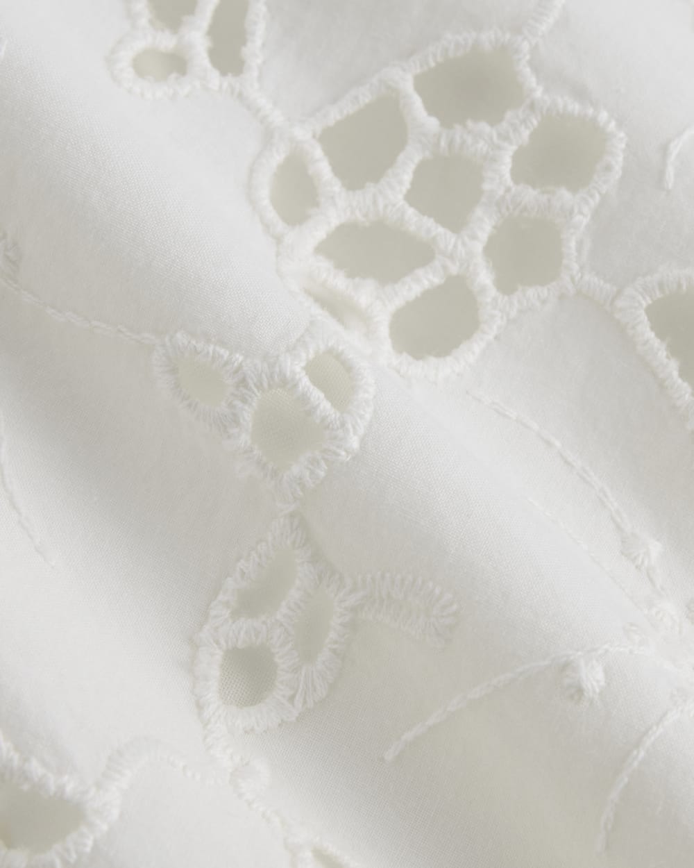 The Eyelet Pull-On Short in Bone — detail view