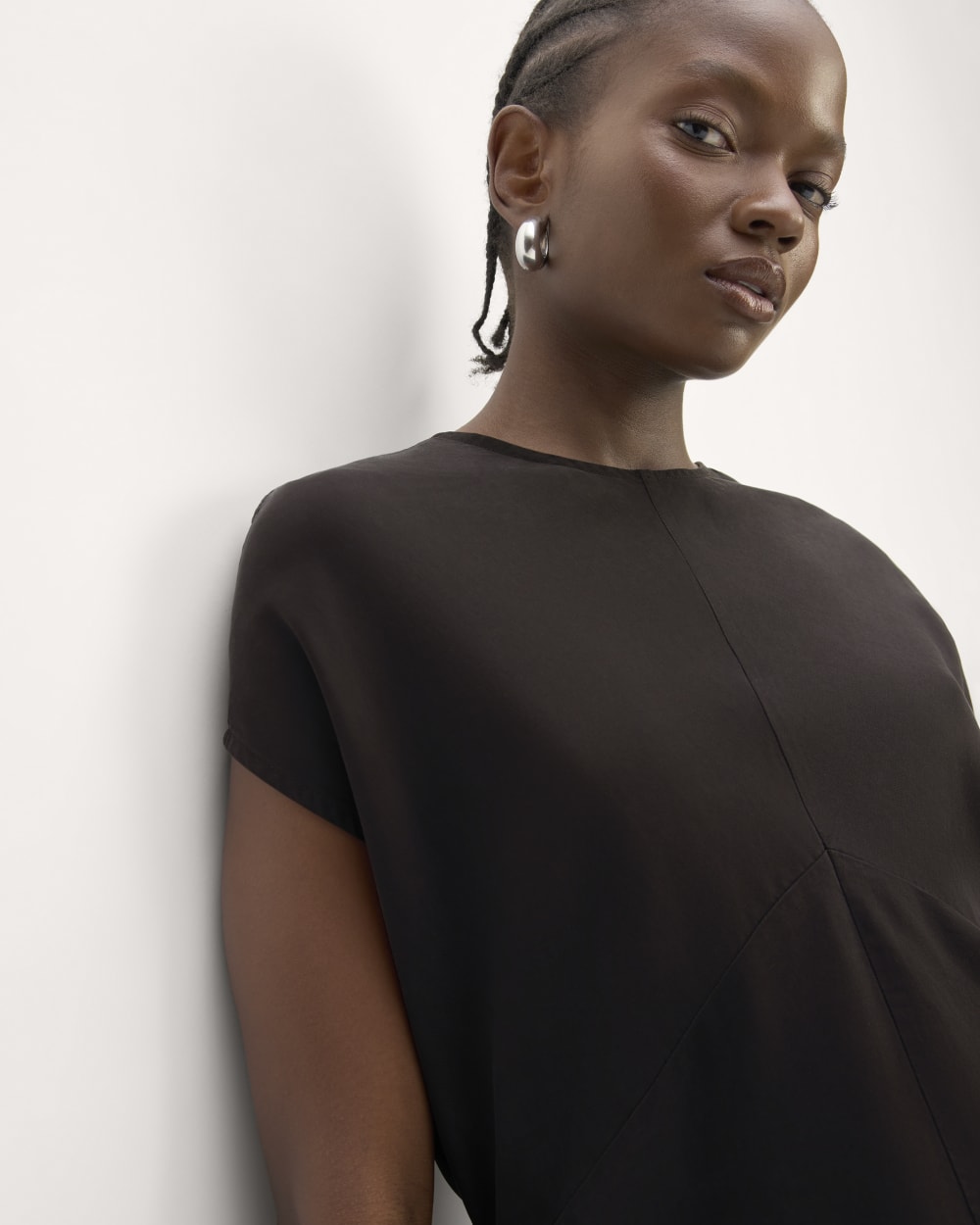 The Drape Top in Butterlite in Black — detail view
