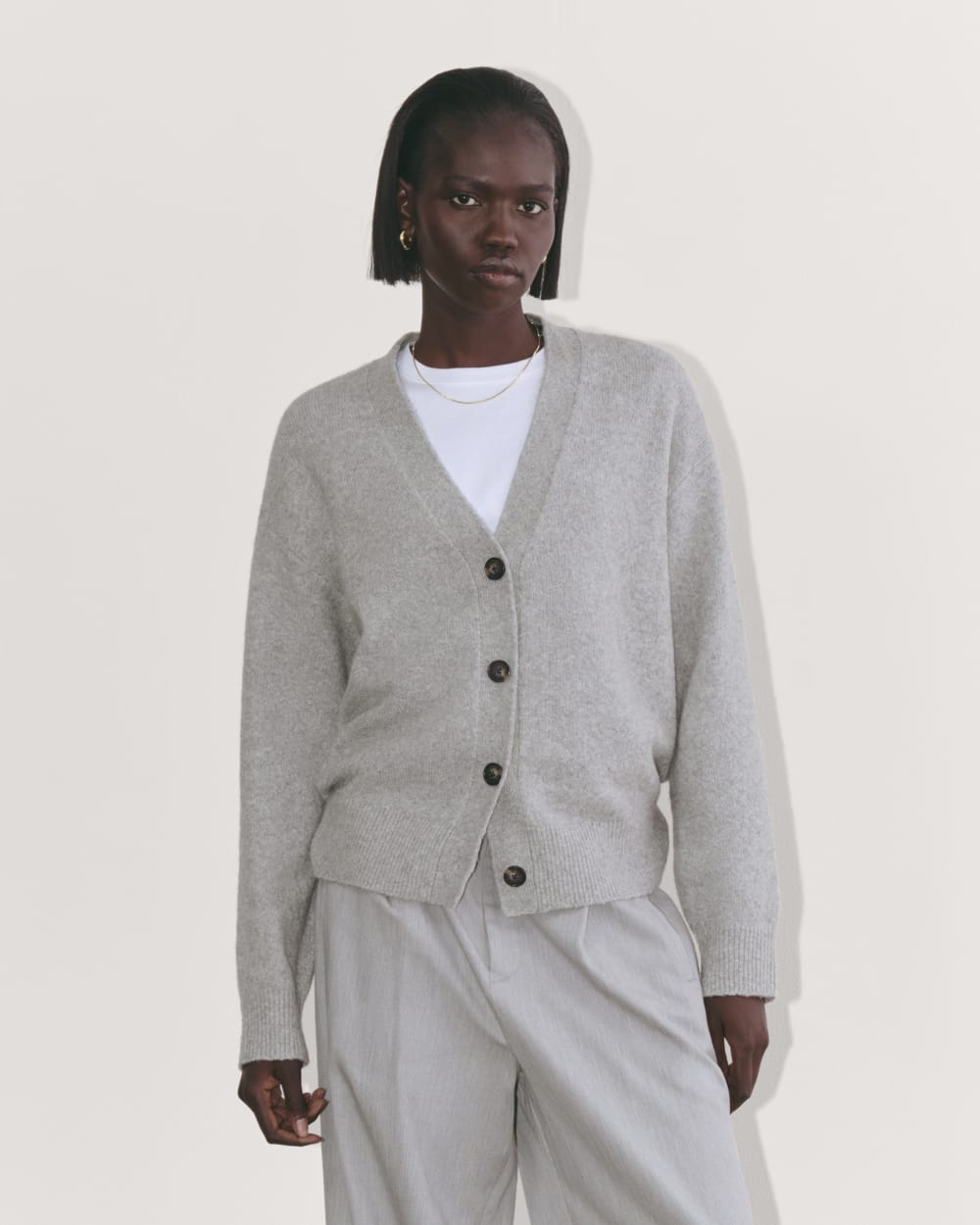 The Cocoon Cardigan in Plush Cotton in Heathered Grey — front view