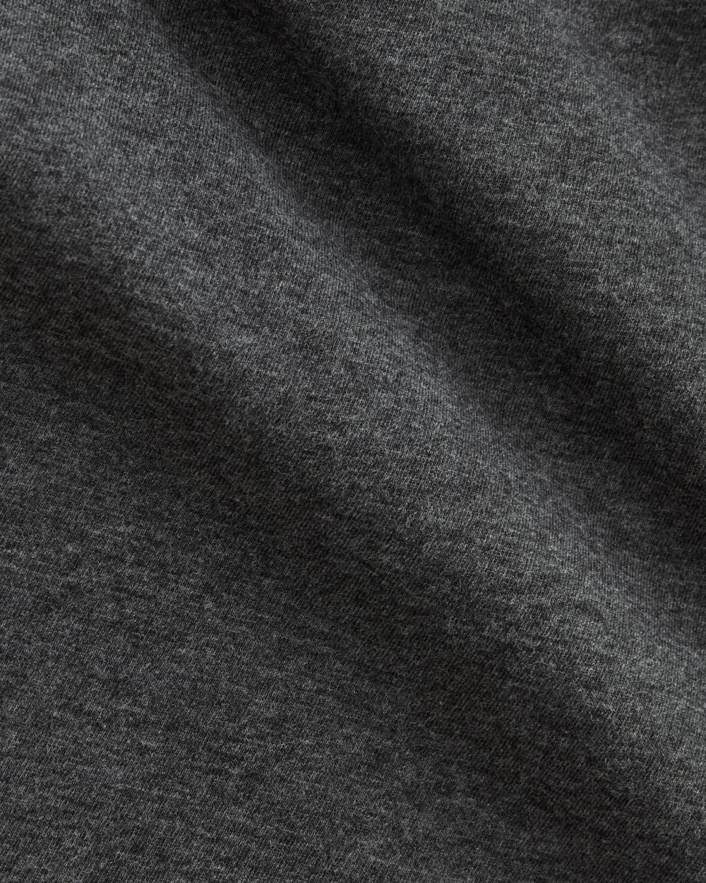 The Slim V-Neck Tee in Essential Cotton in Heathered Soot — detail view