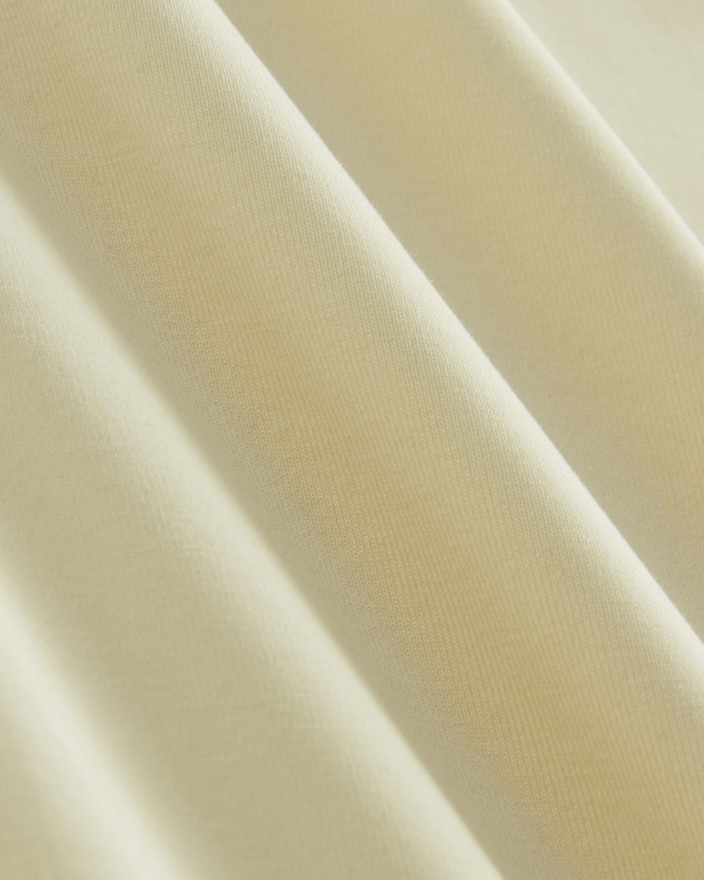The Tank Midi Dress in Butterknit in Light Yellow — detail view