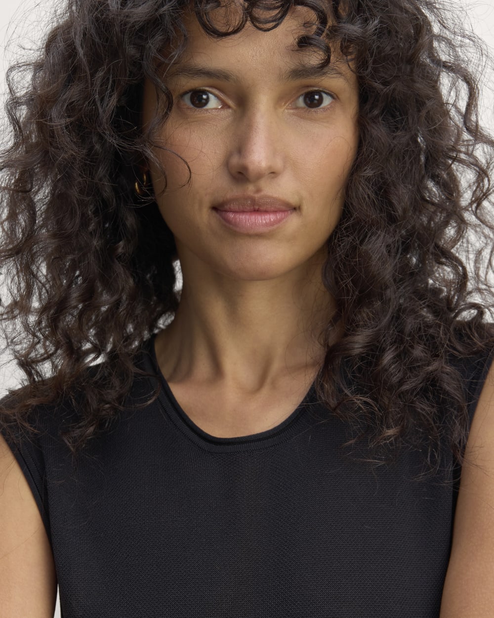 The Knit Pleated Dress in Black — detail view
