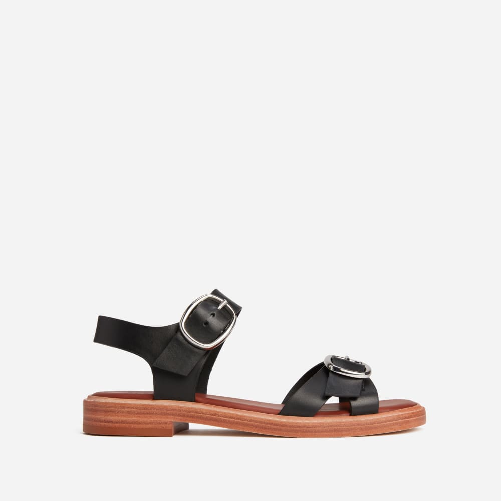 The Twin Buckle Sandal in Black — front view