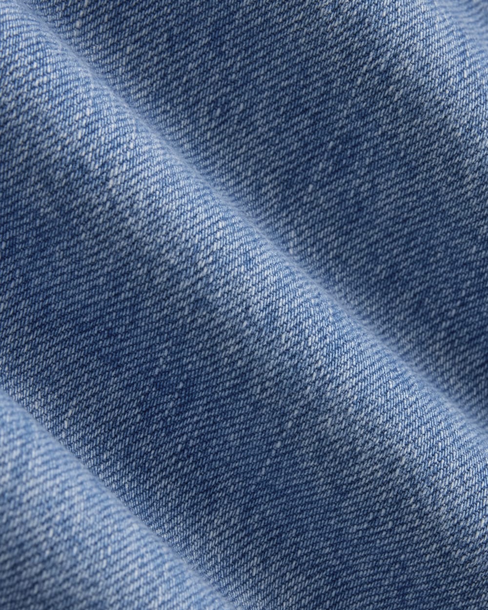 The Long A-Line Denim Short in Light Indigo — detail view