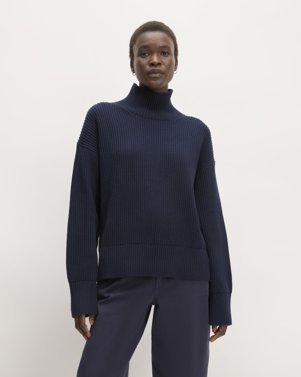 The Organic Cotton Ribbed Turtleneck in Navy — front view