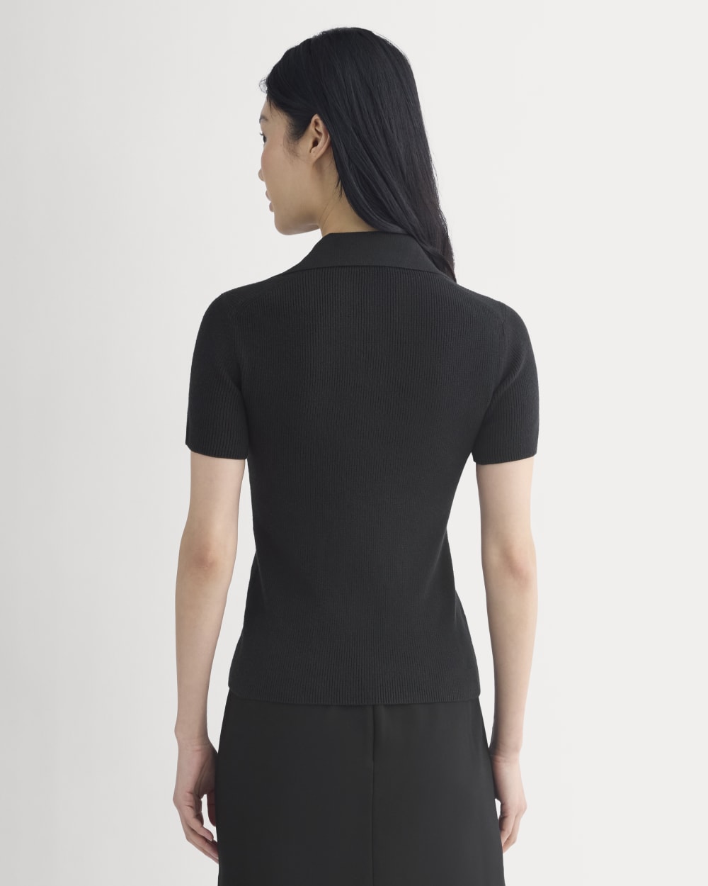 Knit Quarter-Zip Polo in Black — detail view