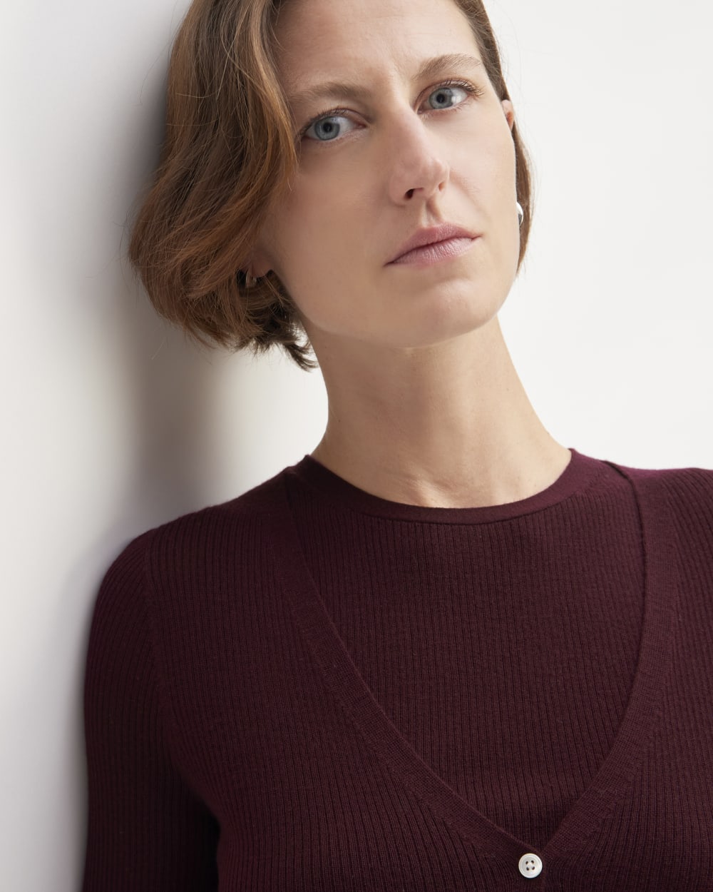 The Cardigan in Ultrasoft Merino in Burgundy — detail view