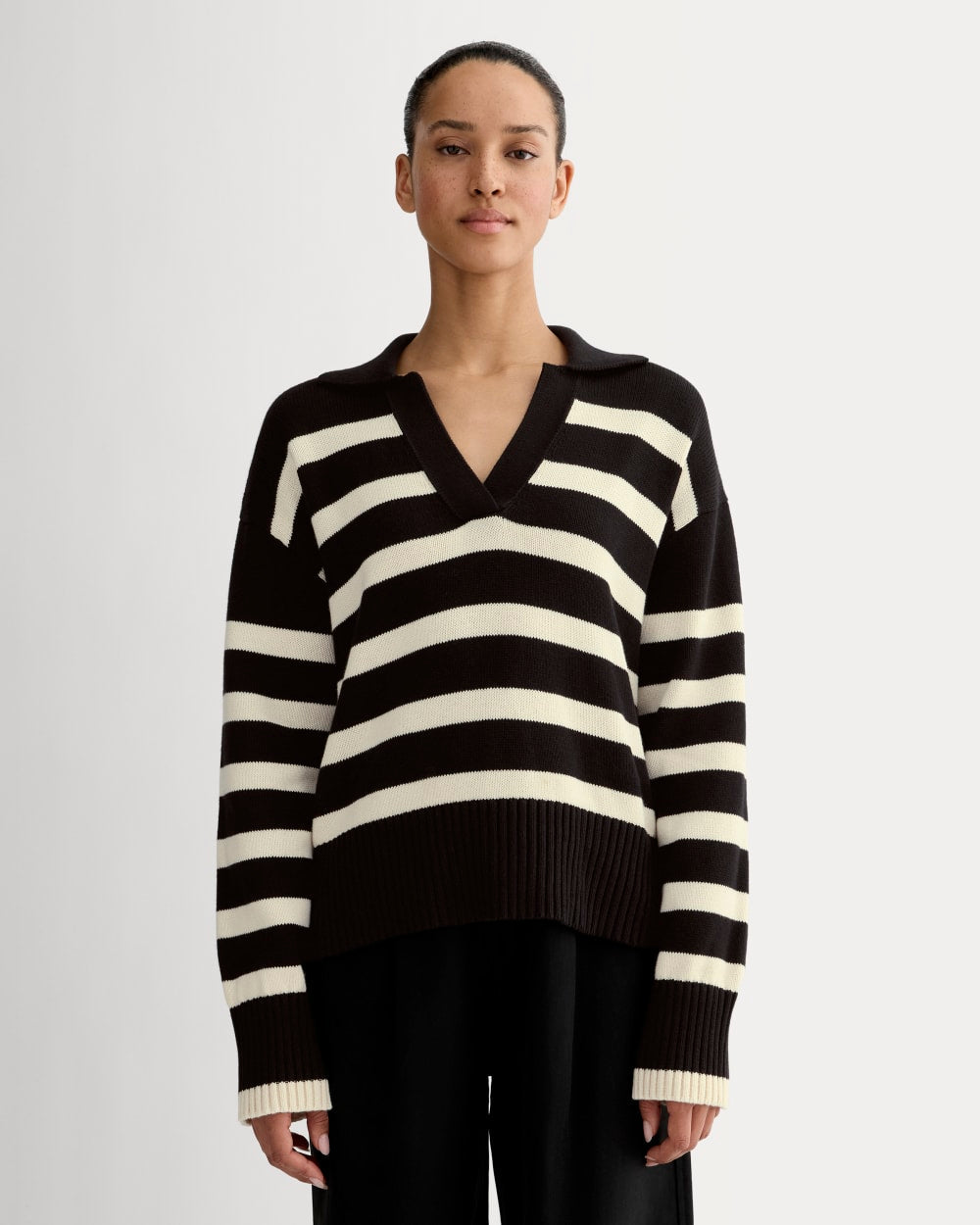 The Boxy Polo in Everyday Cotton in Black / Canvas — front view