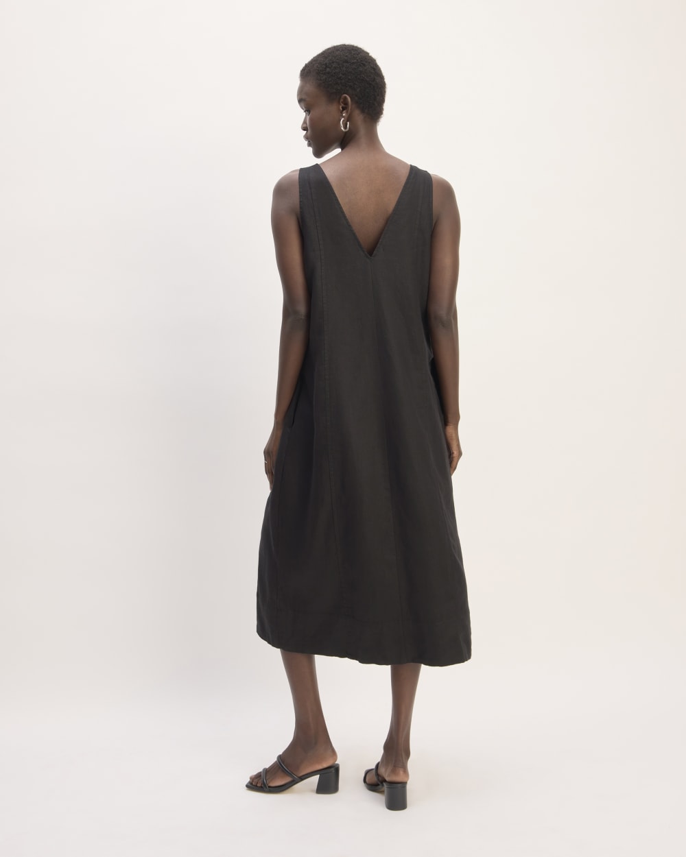 The Linen V-Neck Midi Dress in Black — detail view