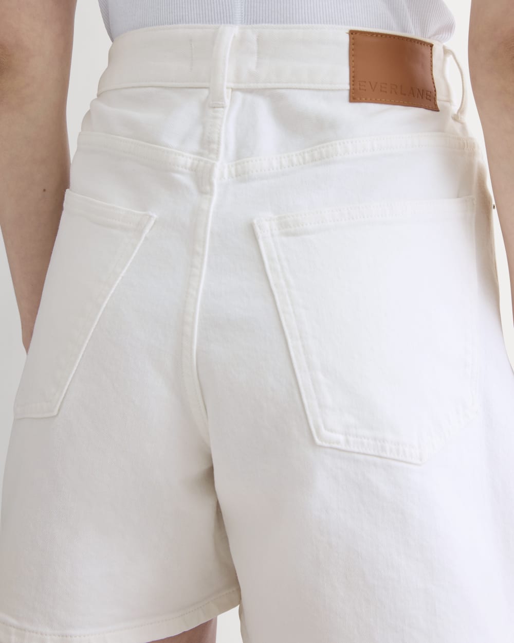 The A-Line Denim Short in White — detail view