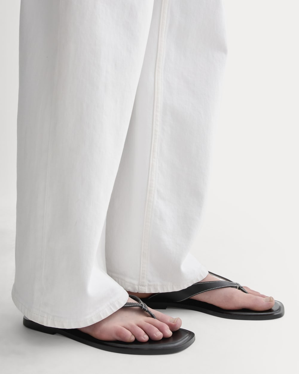 The Leather Flip Flop in Black — detail view