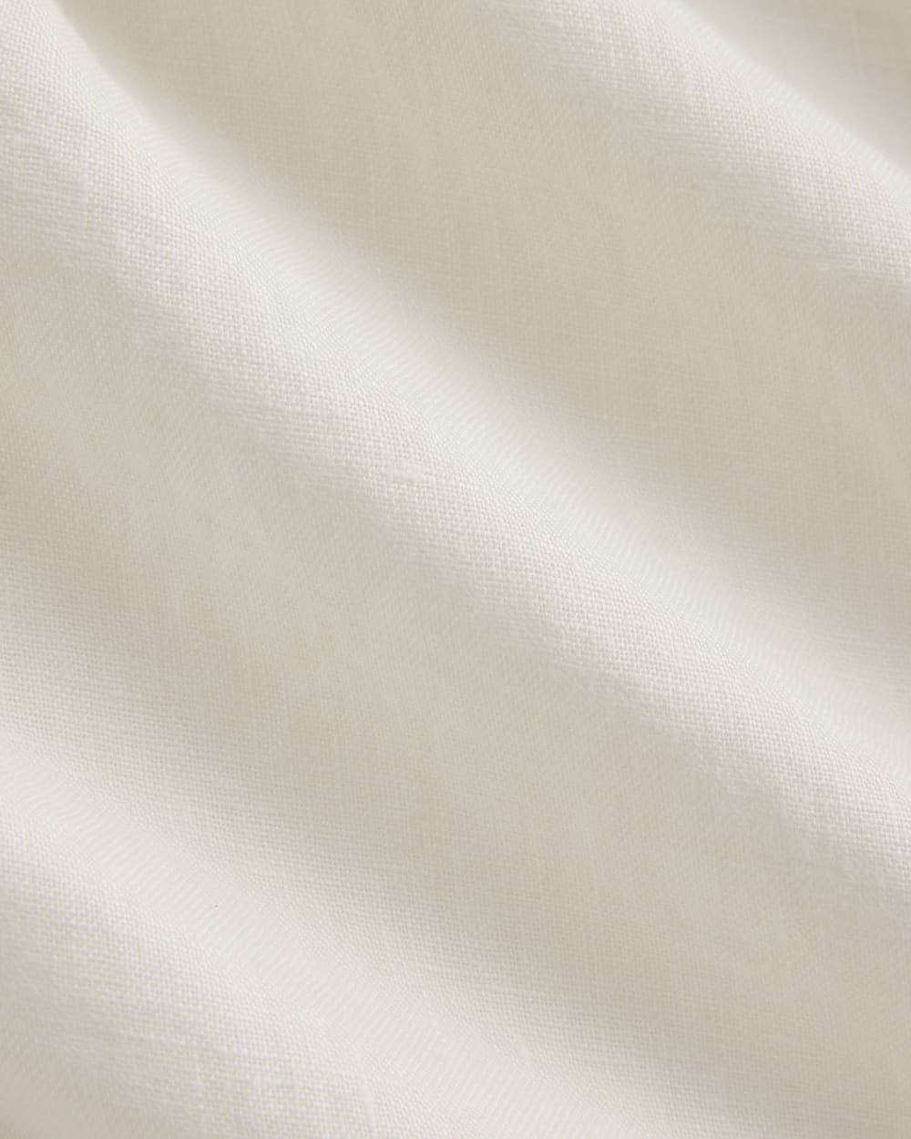 The Linen High-Neck Tank in Bone — detail view