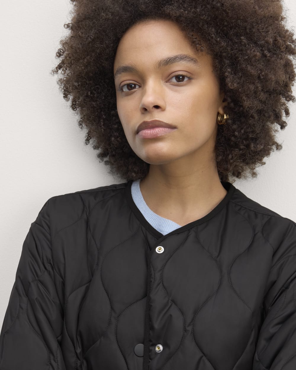 The Long Quilted Liner in Black — detail view